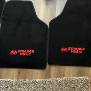 Brand new car floor Mats. Strange music.